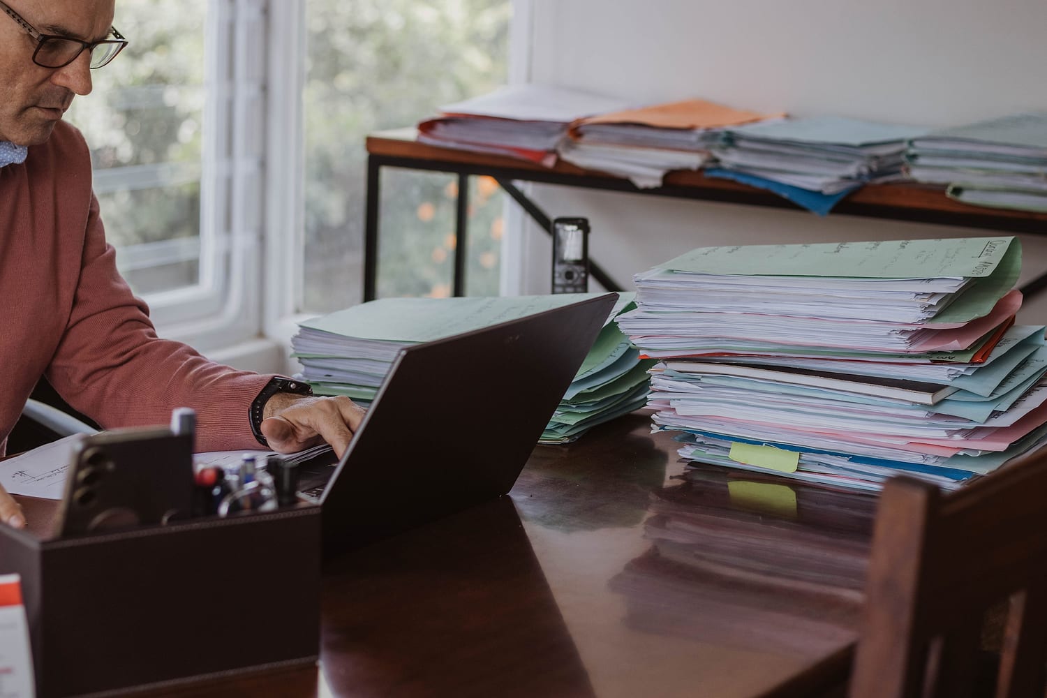 Marlo Laubscher at his desk in the firm's Paarl offices
